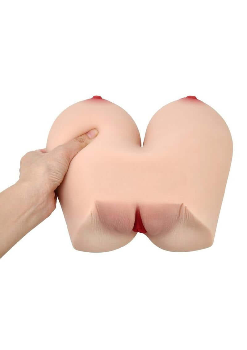 Star Stroker Keisha Grey Titwomen Double Sided Masturbator held in hand, showcasing realistic design and reversible features.