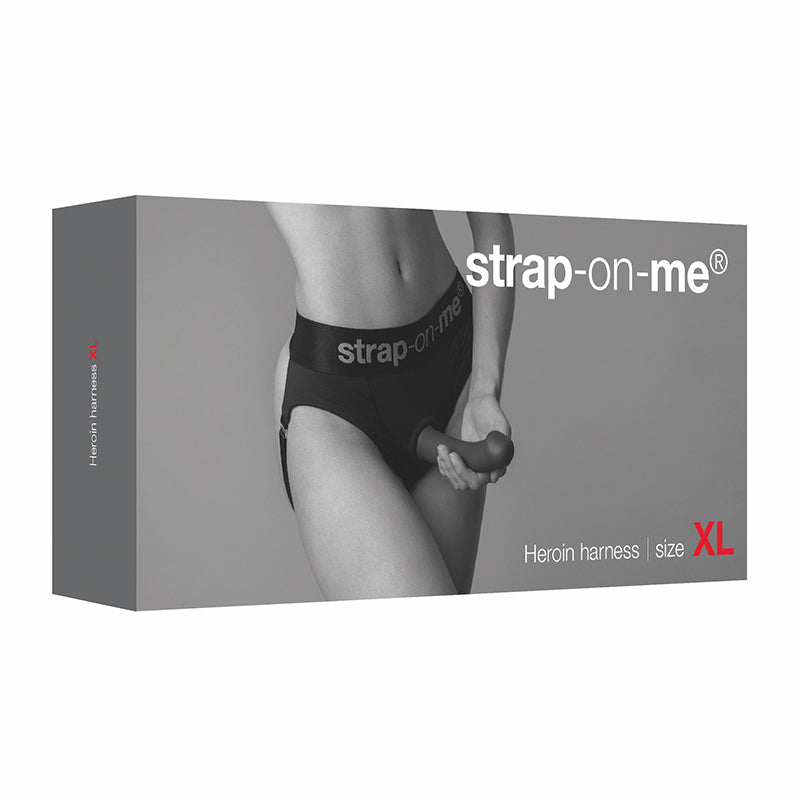 Strap-on-me Heroine Lingerie Harness Xl package with model holding the harness wear.