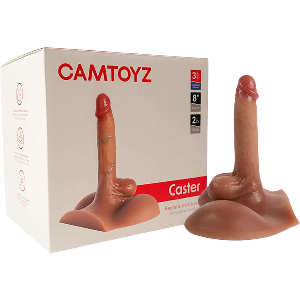 Camtoyz Caster Realistic Torso Dildo with Balls displayed next to its packaging, showcasing detail and design.