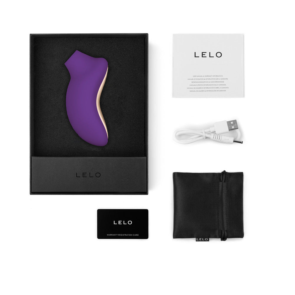 LELO SONA 2 Cruise Rechargeable Clitoral Stimulator Purple in packaging with accessories and USB charger.