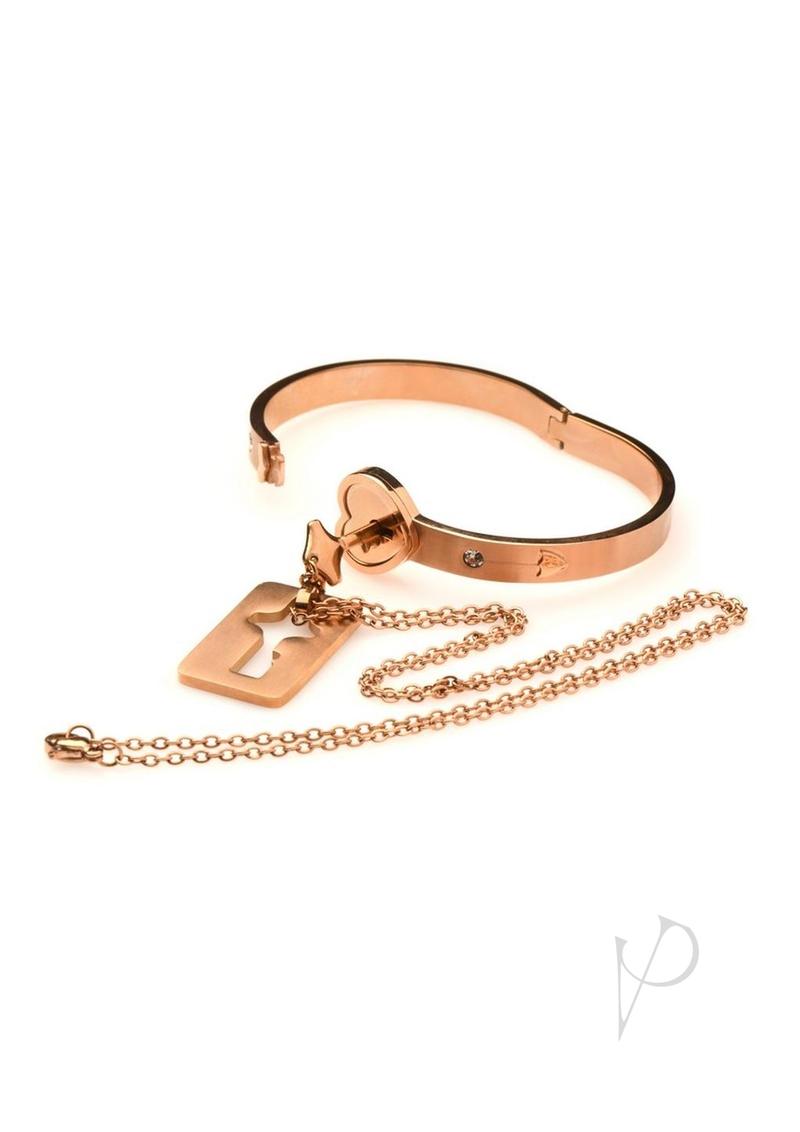 Master Series Locking Bracelet and Key Necklace Rose Gold, an elegant heart-shaped cuff with key necklace.