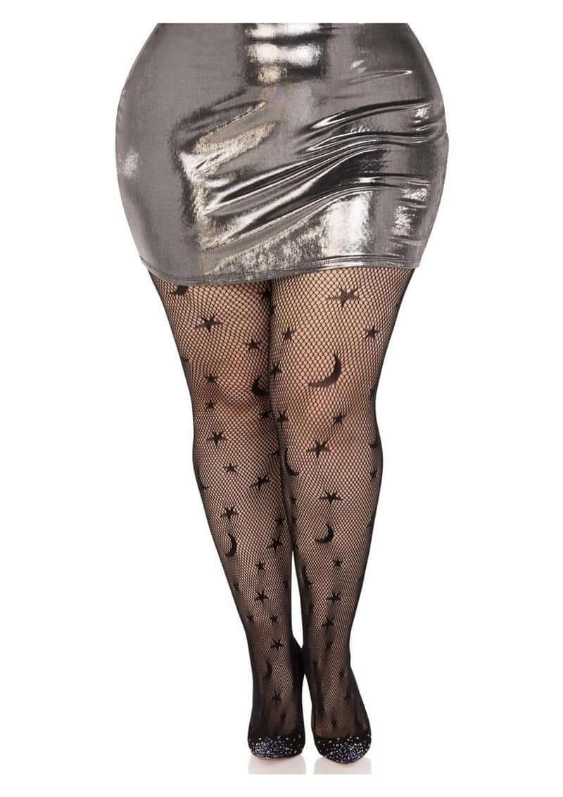 Leg Avenue Celestial Net Tights 1X 2X Black worn under a shiny metallic mini skirt, featuring a celestial pattern.