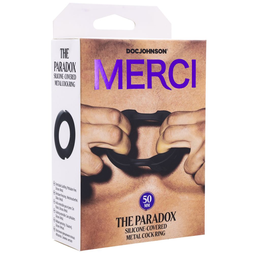 Merci The Paradox Silicone Metal Cock Ring 50mm Black packaging showcasing its design and features.