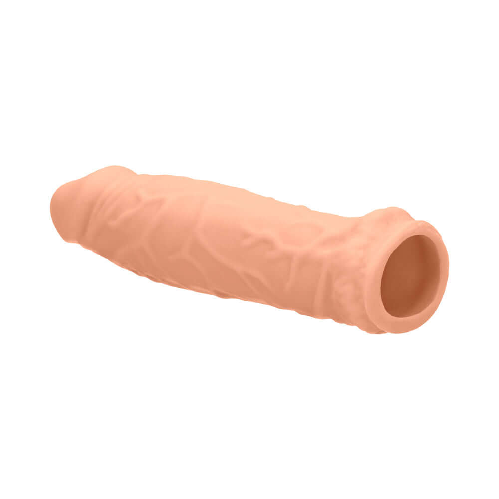 RealRock Realistic 6 inches Penis Sleeve Extender Beige, showcasing realistic design and texture for enhanced experience.