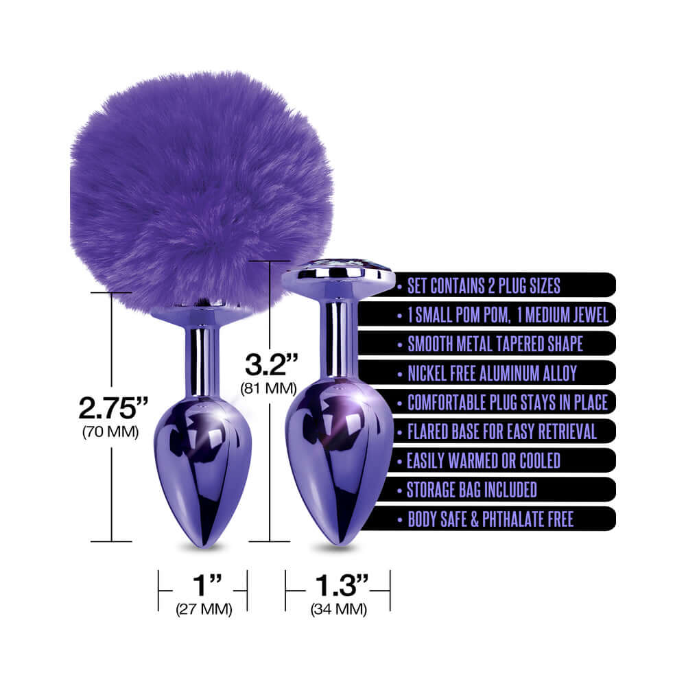 NIXIE Metal Butt Plug Set Pom Pom & Jewel-Inlaid Purple showcasing two plugs with purple pom pom and jewel details.