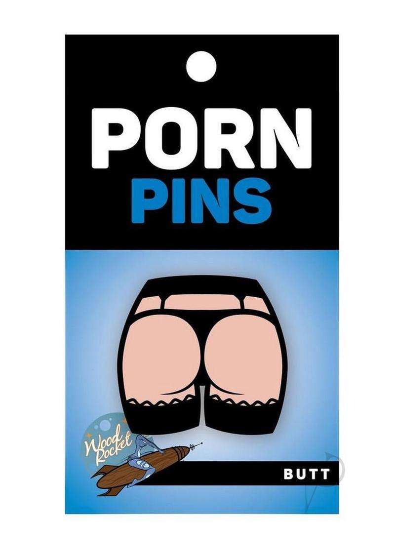 WoodRocket Butt Enamel Pin Black/Vanilla on a packaging featuring a humorous butt illustration.