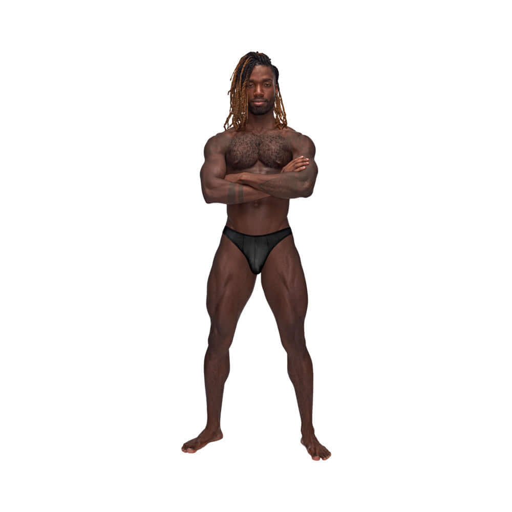 Male Power Barely There Moonshine Black S M model showcasing a daring jock brief with minimal coverage and full rear exposure.