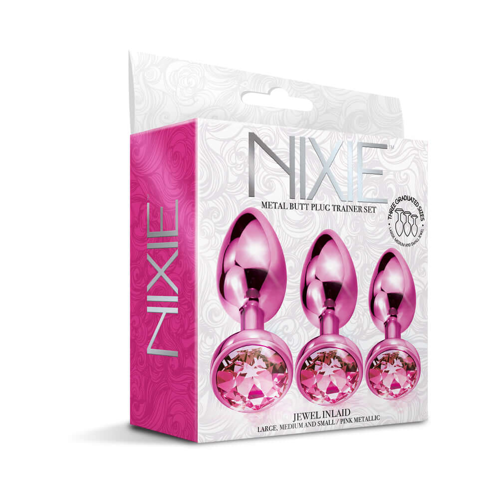 Nixie Metal Butt Plug Trainer Set 3 Piece Pink Metallic packaging showcasing a large, medium, and small butt plug with jewels.