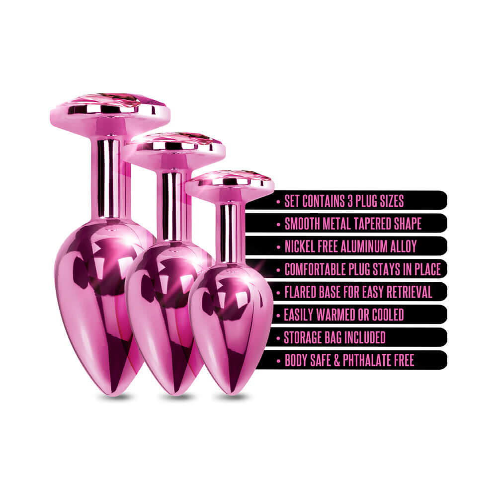 Nixie Metal Butt Plug Trainer Set 3 Piece Pink Metallic with three sizes, smooth aluminum alloy, and storage bag included.