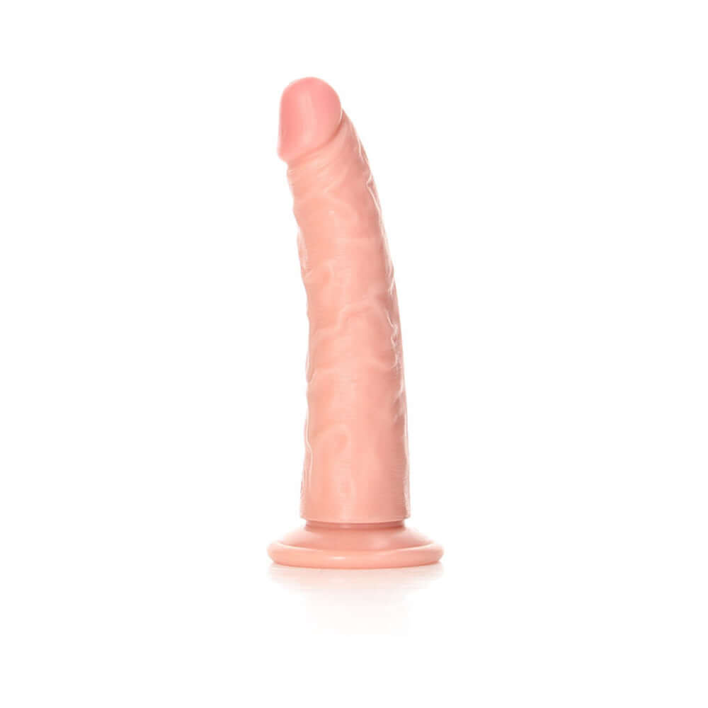 RealRock Realistic 6 inches Slim Dildo With Suction Cup Beige displayed on a white background.