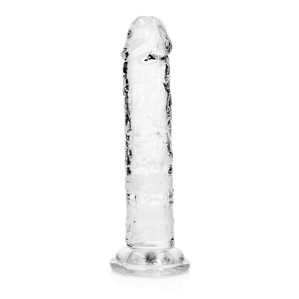 RealRock Crystal Clear Straight 6 inches Dildo Without Balls Clear on a white background.