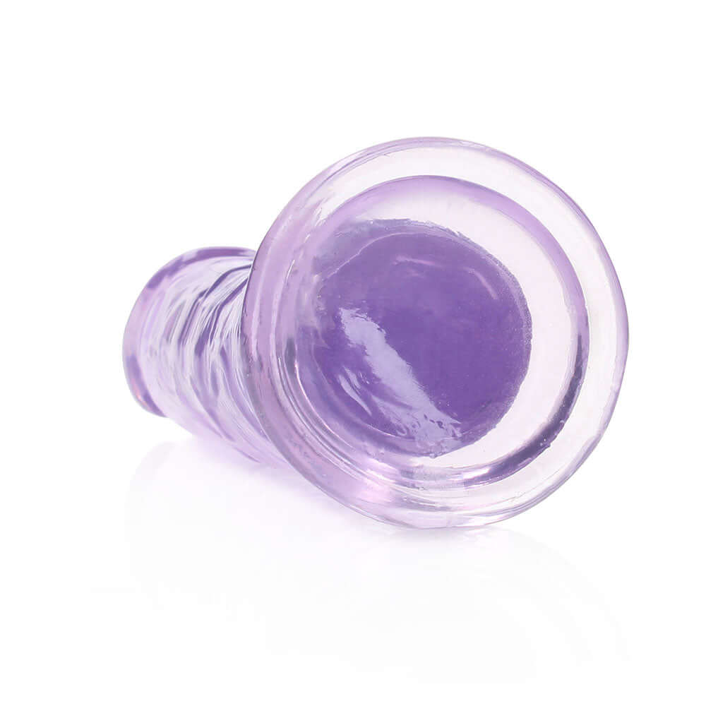 RealRock Crystal Clear Straight 6 inches Dildo Without Balls Purple, showcasing a sleek and transparent design.