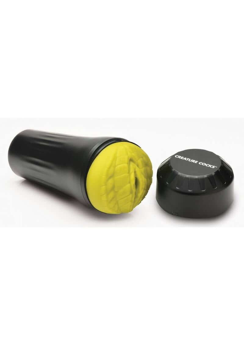 Creature Cock Fuckzilla Silicone Pussy Stroker Green showing a black casing with yellow textured interior.