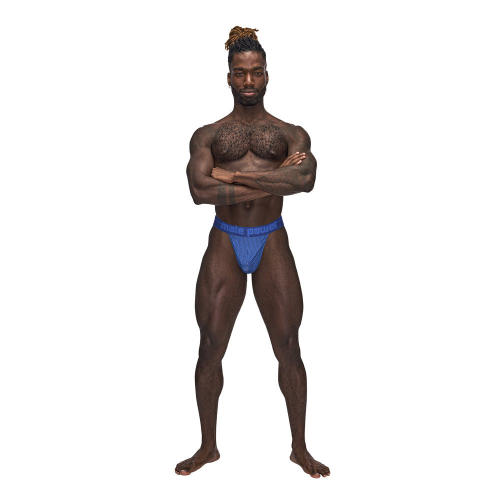Model wearing Male Power Sexagon Micro V Thong Royal S M in royal blue showcasing bold style and comfort.