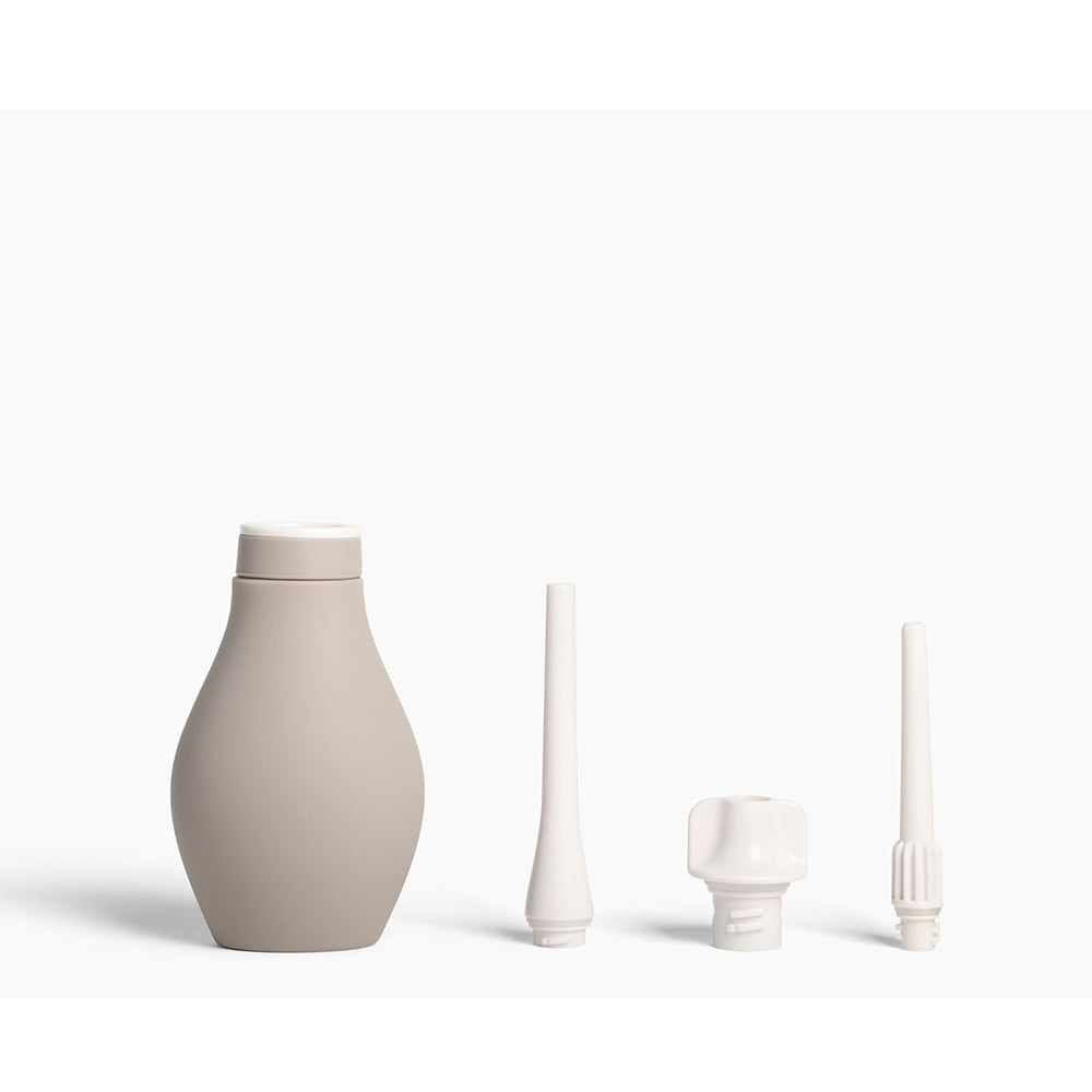 Du Douche Stone with various tips for versatile use and modern design for a premium cleansing experience.