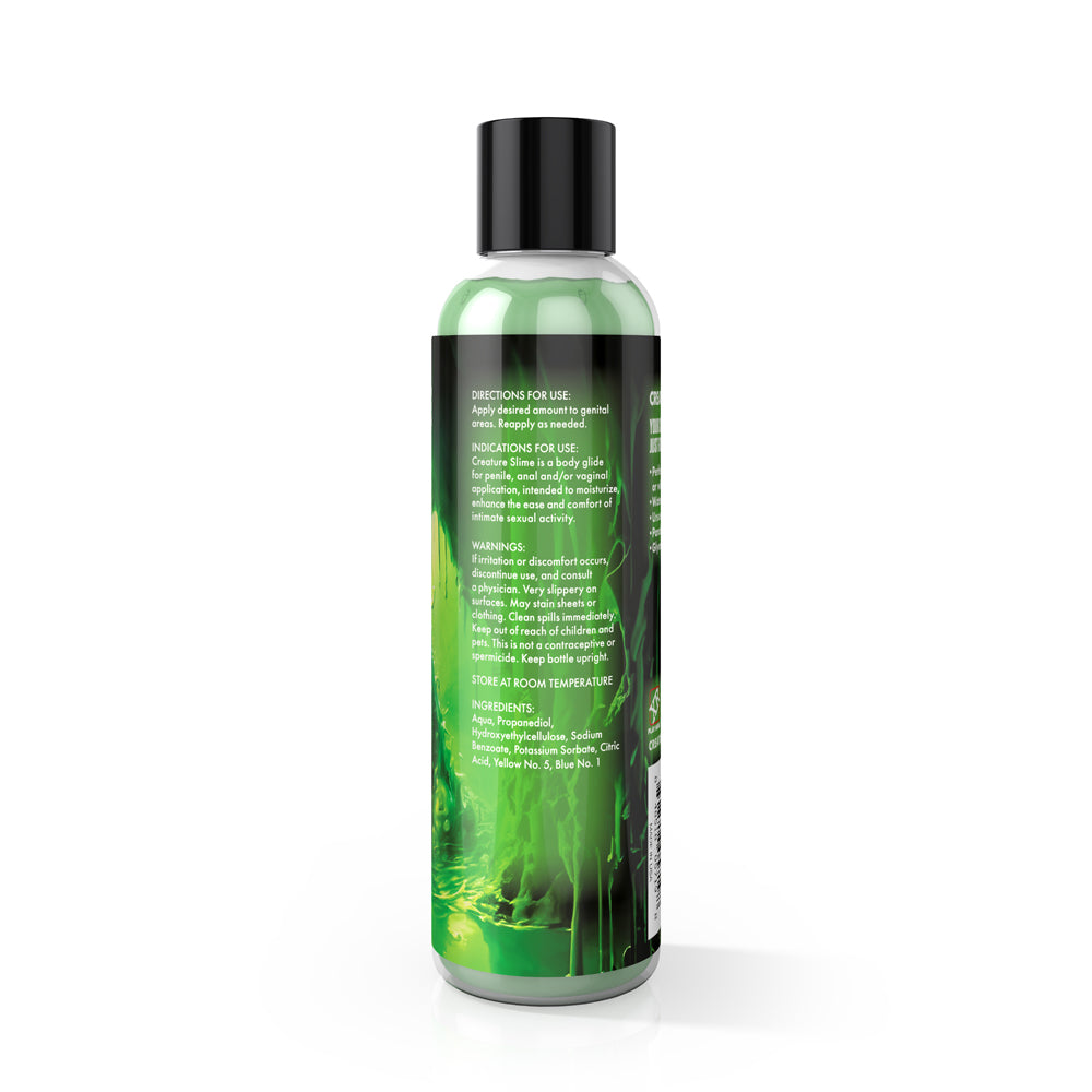 Creature Cocks Green Creature Slime Water Based Lube 8 Oz bottle with instructions and ingredients on label.