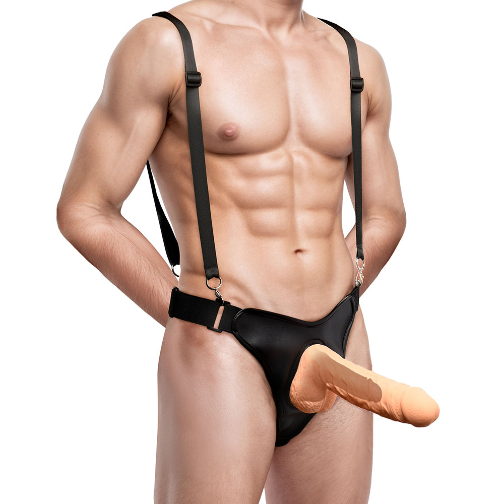 Master Series Magnum 9 inch Hollow Silicone Dildo & Harness on muscular model showcasing fit and design.