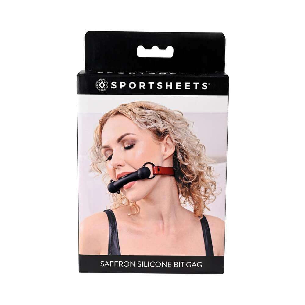 Sportsheets Saffron Silicone Bit Gag with Adjustable Buckle in packaging, showcasing its sleek design and comfort features.