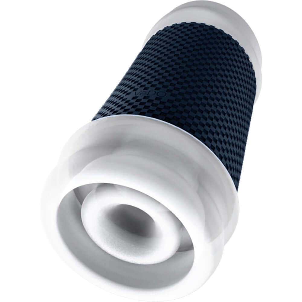 Vedo Spank Rechargeable Vibrating Stroker Clear featuring a stretchable textured sleeve and removable vibrating bullet.