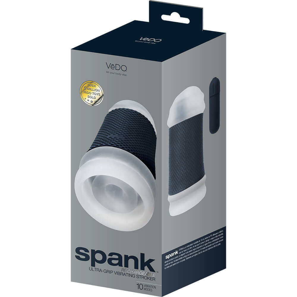 Vedo Spank Rechargeable Vibrating Stroker Clear packaging showcasing the stylish design and features of the male pleasure device.