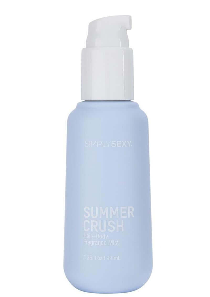 Simply Sexy Pheromone Hair & Body Mist Summer Crush 3.35 Oz in a light blue bottle with a pump top.