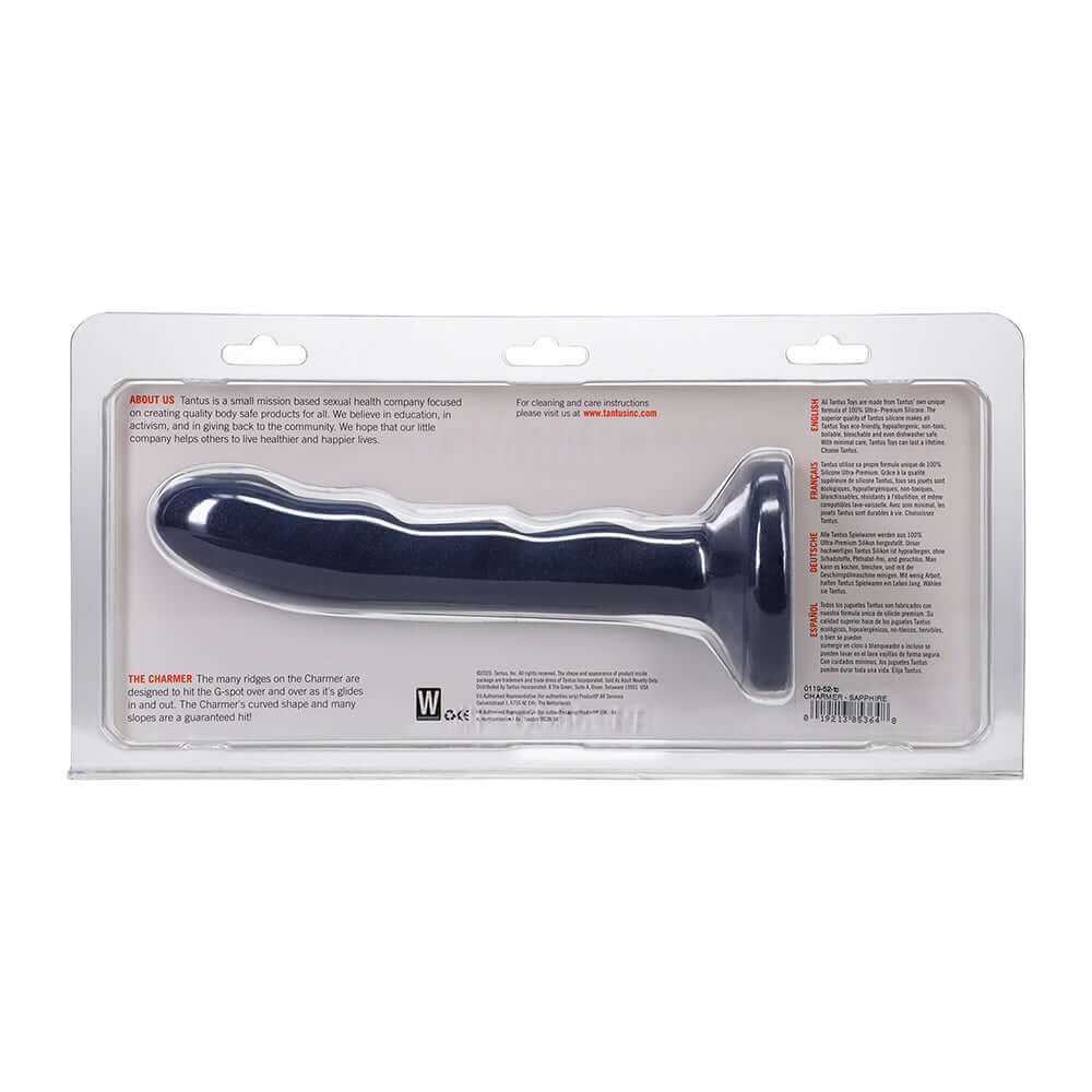 Tantus Charmer 8 Inch G-spot Dildo Sapphire in packaging, showcasing its ridged design and silicone material.
