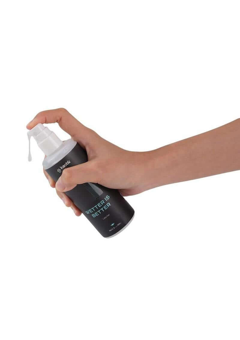 Kaotik Labs Wetter is Better Lube Gel Water Based 5.3 Oz being dispensed from a bottle for enhancing intimate experiences.