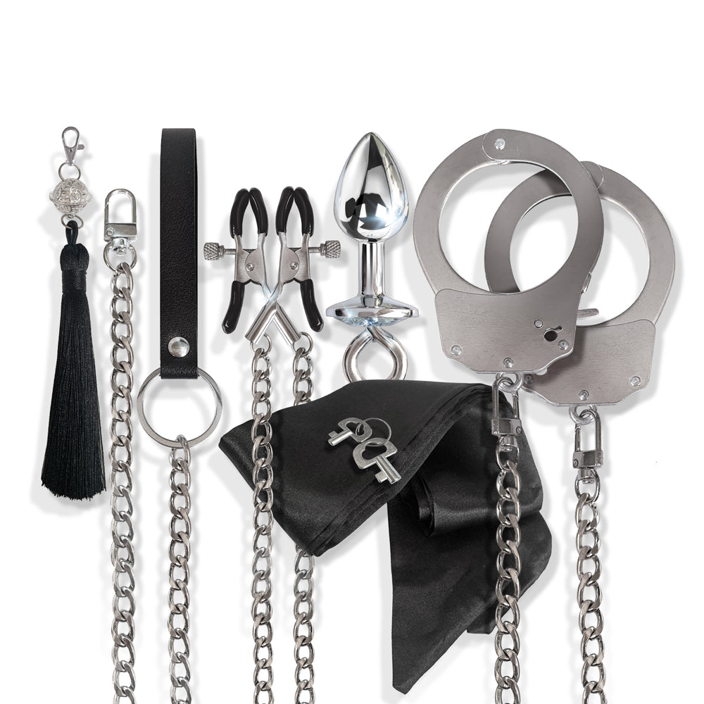 Nixie Metal Bondage 8-piece Kit Silver featuring various BDSM accessories for customization and fantasy fulfillment.