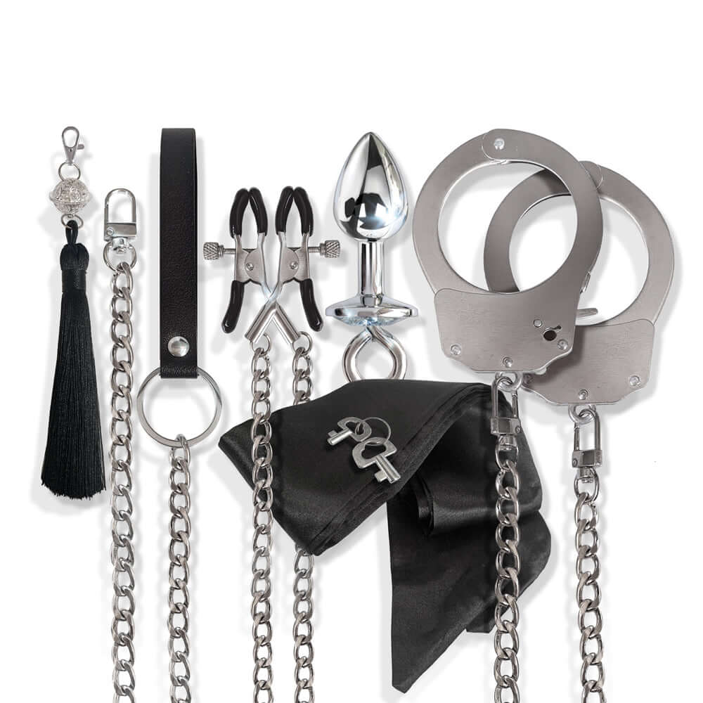 Nixie Metal Bondage 8-piece Kit Silver featuring various BDSM accessories for customization and fantasy fulfillment.