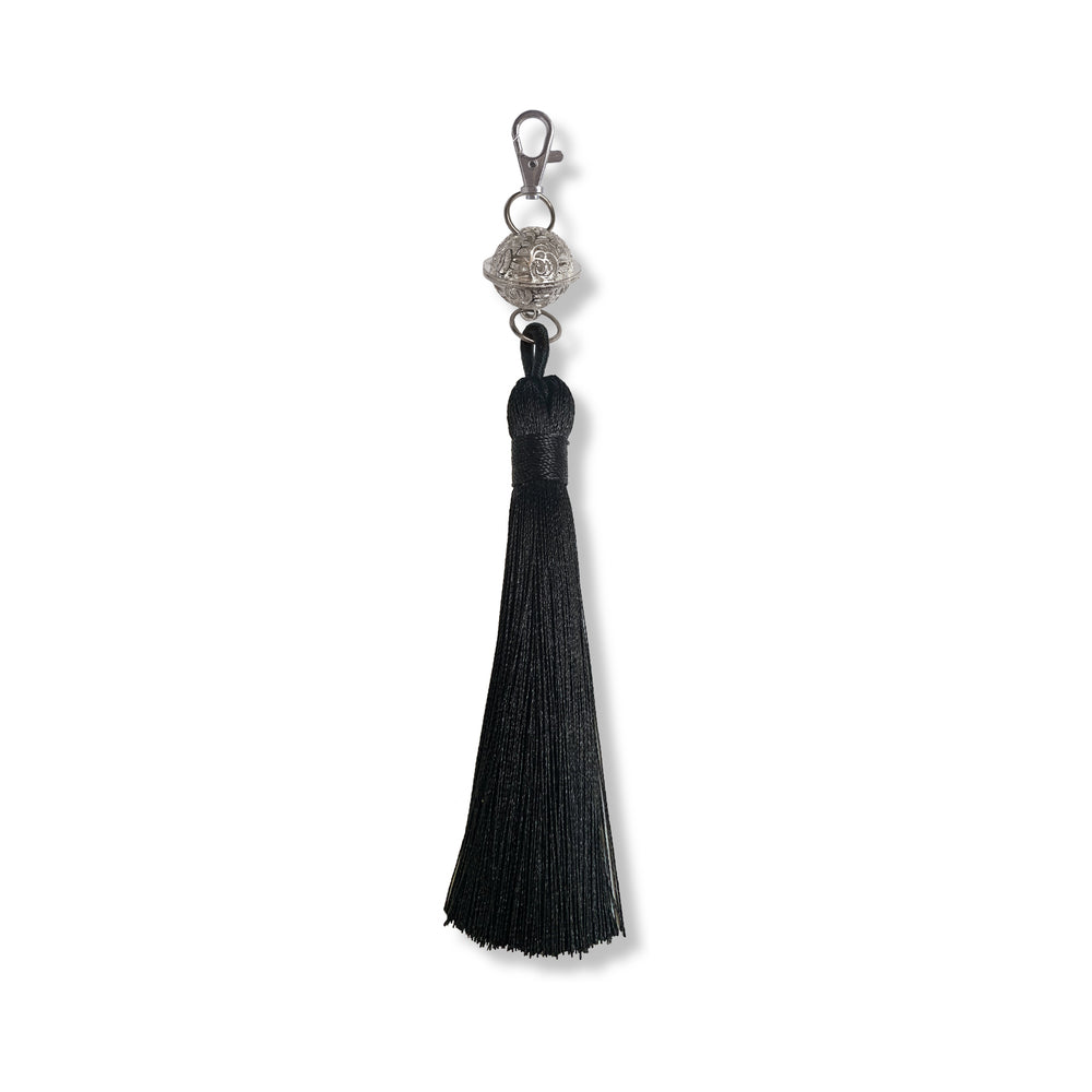 Nixie Metal Bondage 8-piece Kit Silver filigree tassel with ornate silver jingle ball detail