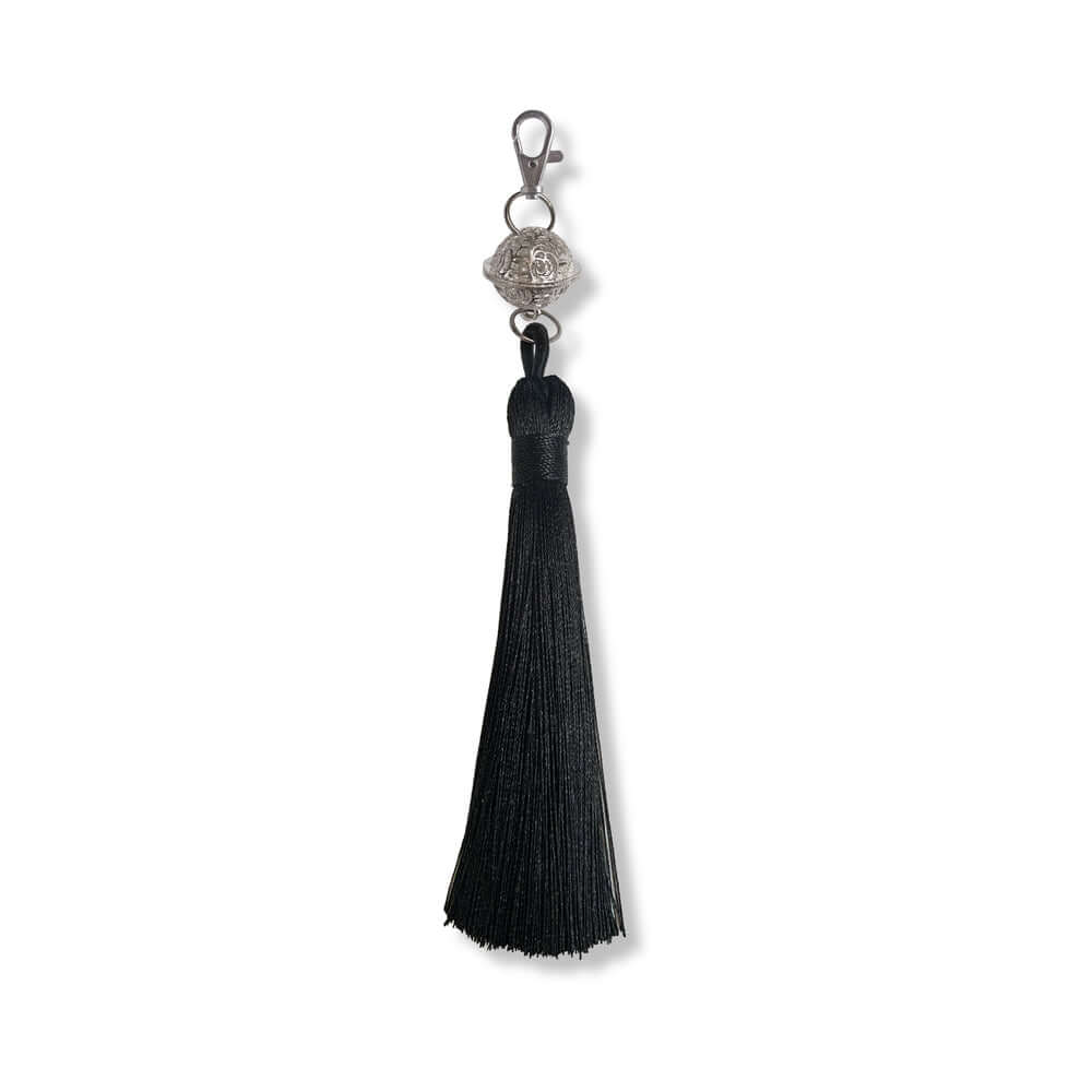 Nixie Metal Bondage 8-piece Kit Silver filigree tassel with ornate silver jingle ball detail
