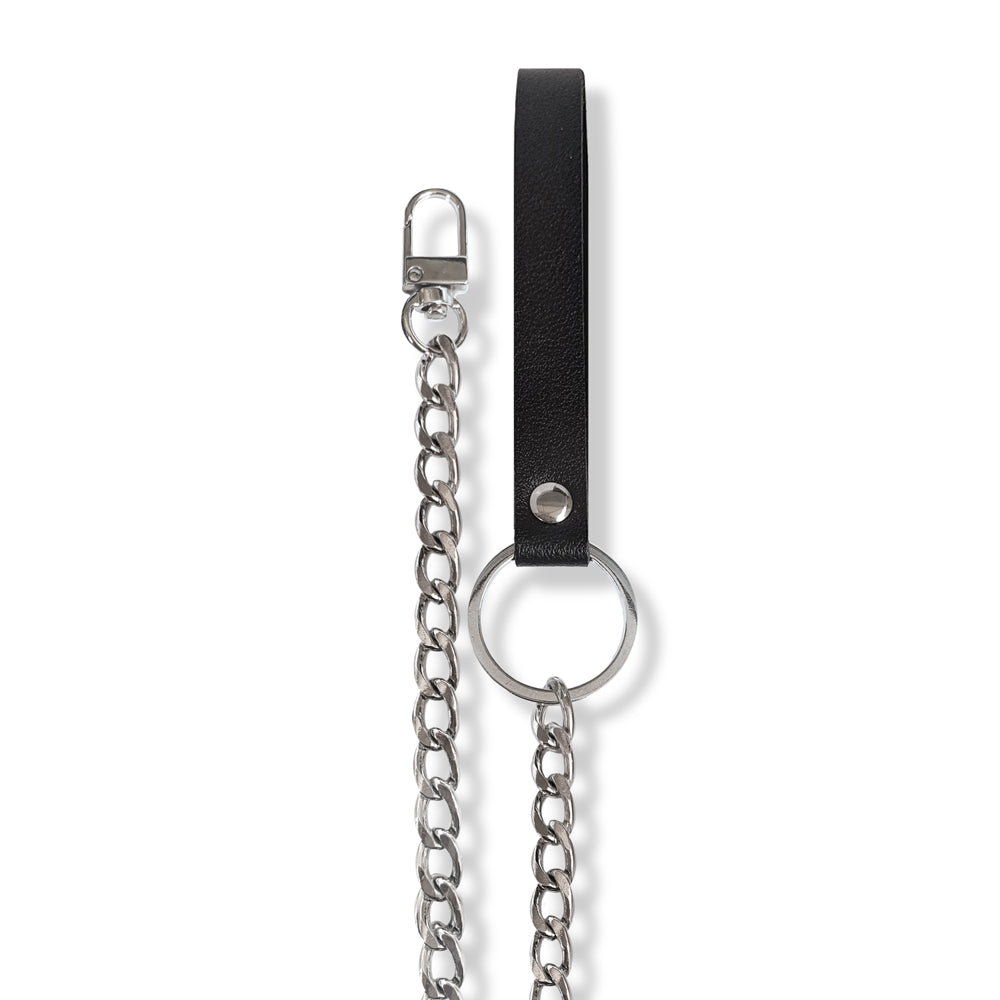 Nixie Metal Bondage 8-piece Kit Silver featuring a black strap and silver chain for BDSM experiences.