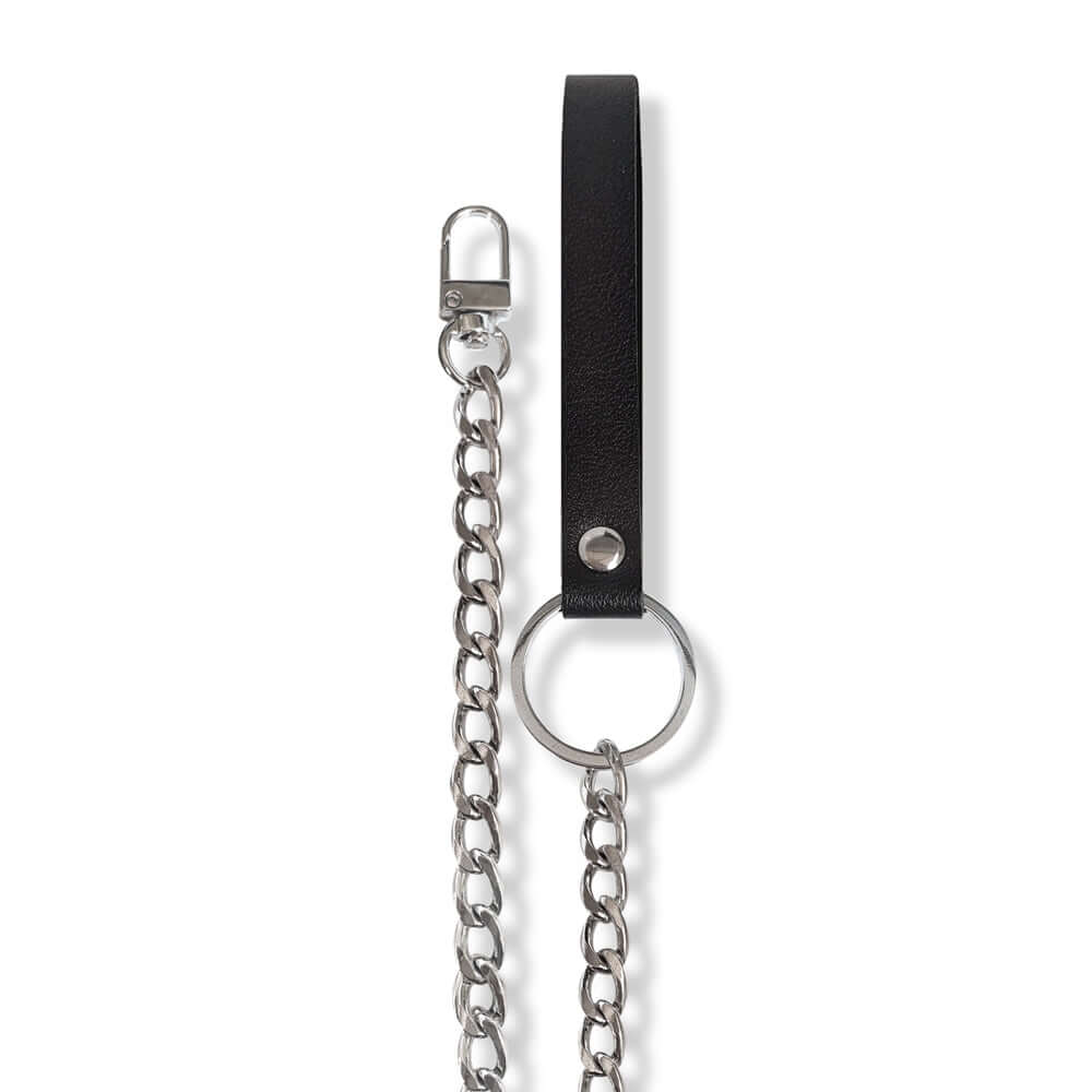 Nixie Metal Bondage 8-piece Kit Silver featuring a black strap and silver chain for BDSM experiences.