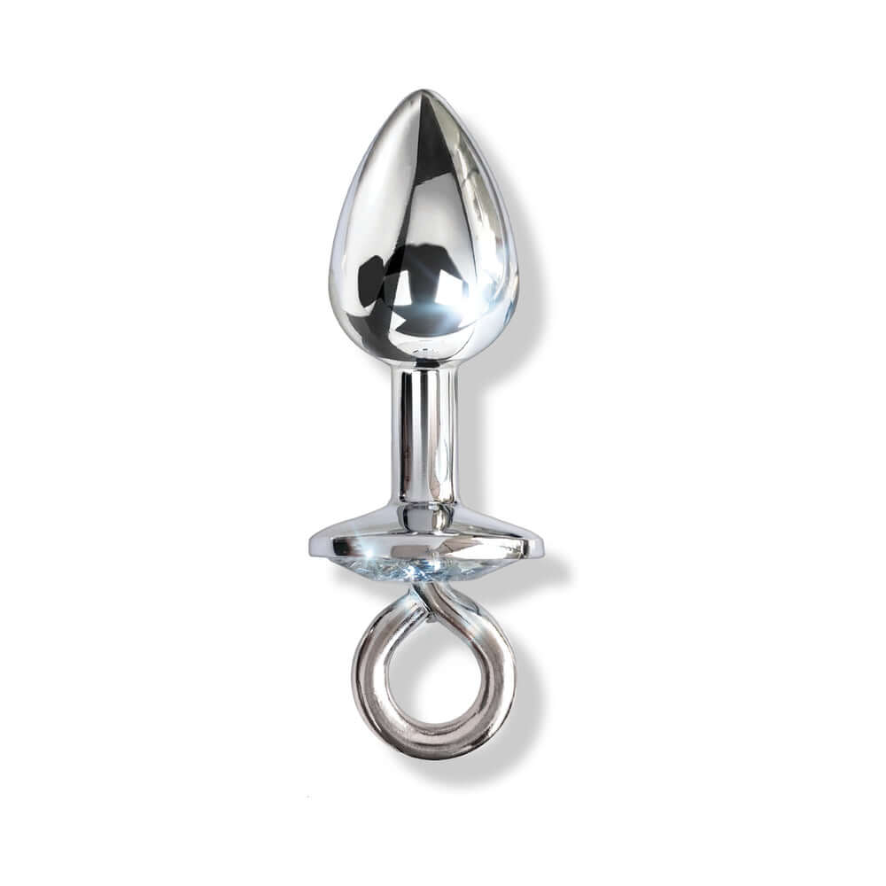 Nixie Metal Bondage 8-piece Kit Silver includes a sleek metallic anal plug with a ringed base for secure handling.