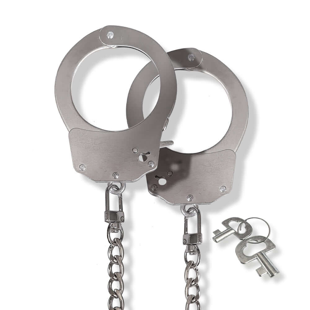 Nixie Metal Bondage 8-piece Kit Silver includes durable metal handcuffs with keys.