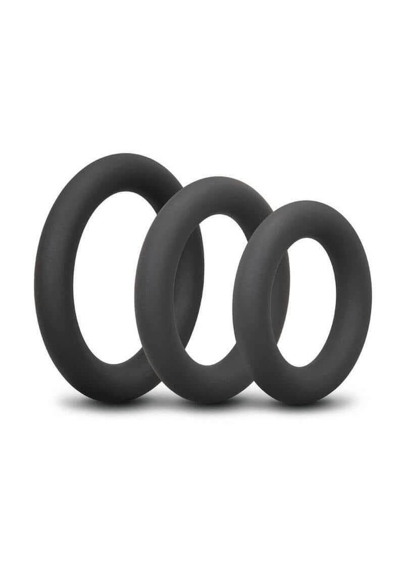 B-Vibe Snug Ring Thick Silicone Cock Ring 3 Pack Black featuring three durable silicone rings in various sizes.