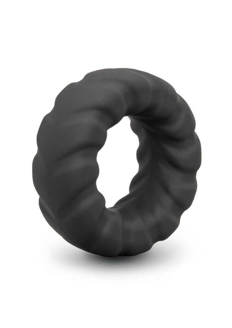 B-Vibe Flex Ring Tread Silicone Cock Ring Black with smooth, seamless design for comfort and durability.