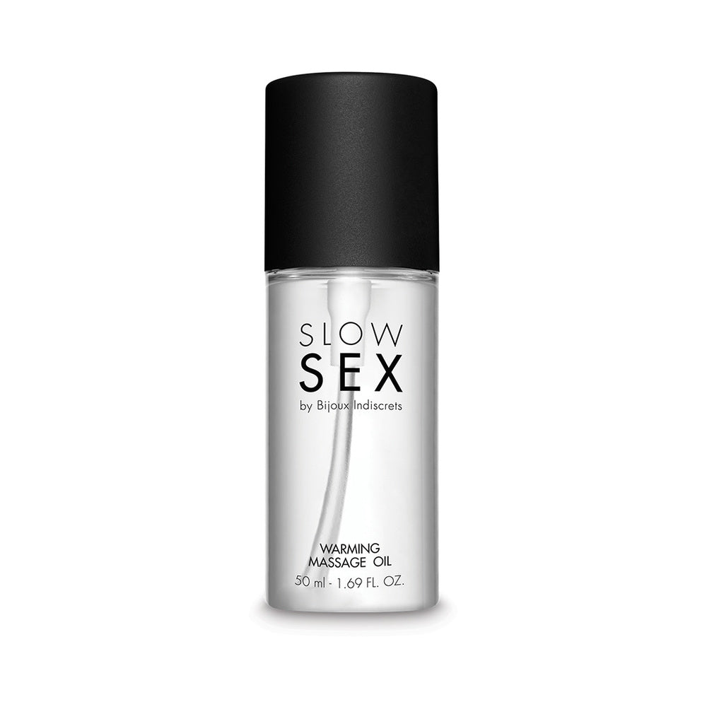 Bijoux Indiscrets Slow Sex Warming Massage Oil 1.69 Oz bottle with black cap and label, ideal for sensual massage.