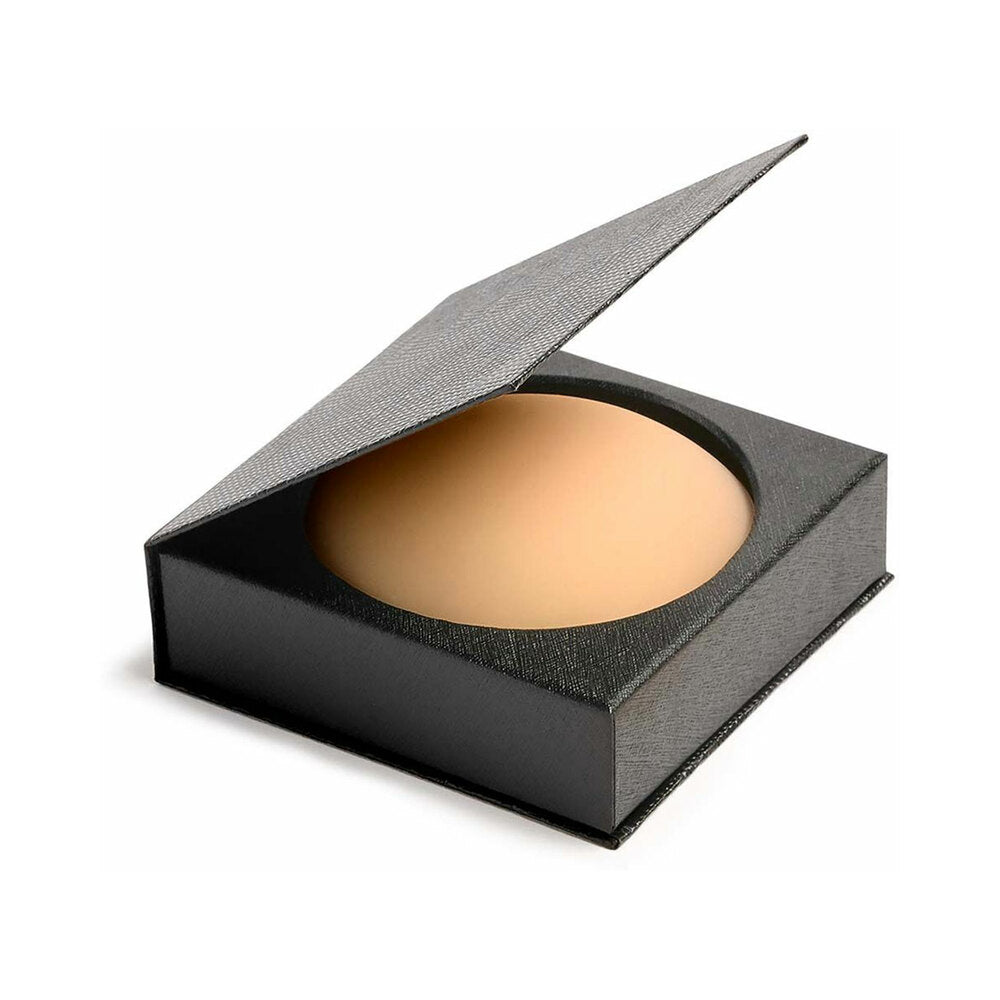Nippies Skin Nipple Covers Size 2 Caramel in a black packaging box with lid open revealing silicone nipple cover.