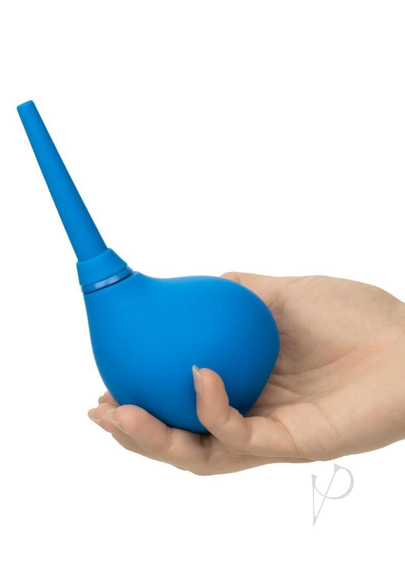 Water Systems One-Way Silicone Anal Douche Blue held in hand showcasing its ergonomic design.