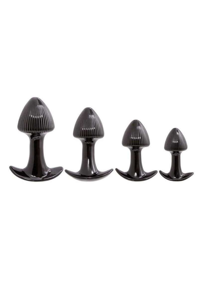 Walk Around Trainer Plugs 4 Pack Black, a set of four tapered anal training plugs in black for comfortable exploration.