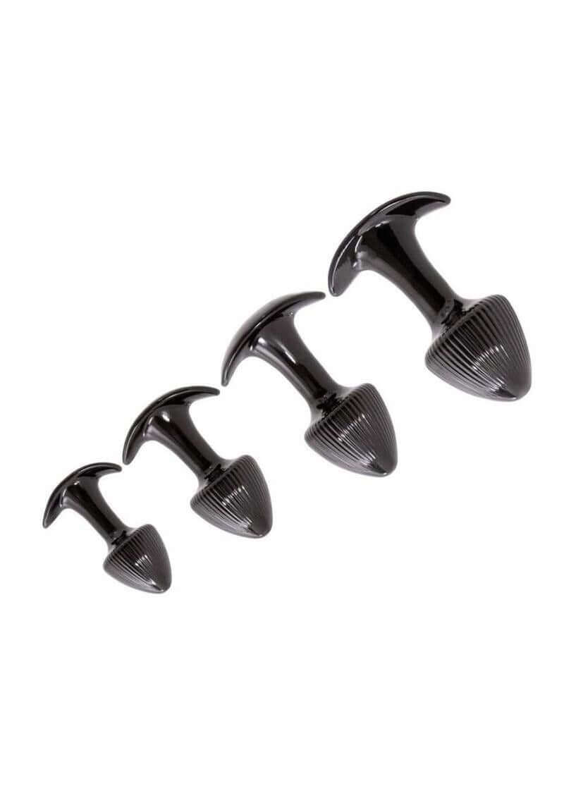 Walk Around Trainer Plugs 4 Pack Black featuring four tapered black anal training plugs for comfortable exploration.