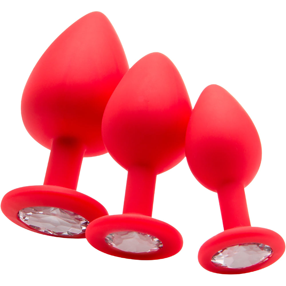 Ouch Regular Diamond Butt Plug Red in three sizes with smooth silicone and jewel-style base for anal play.