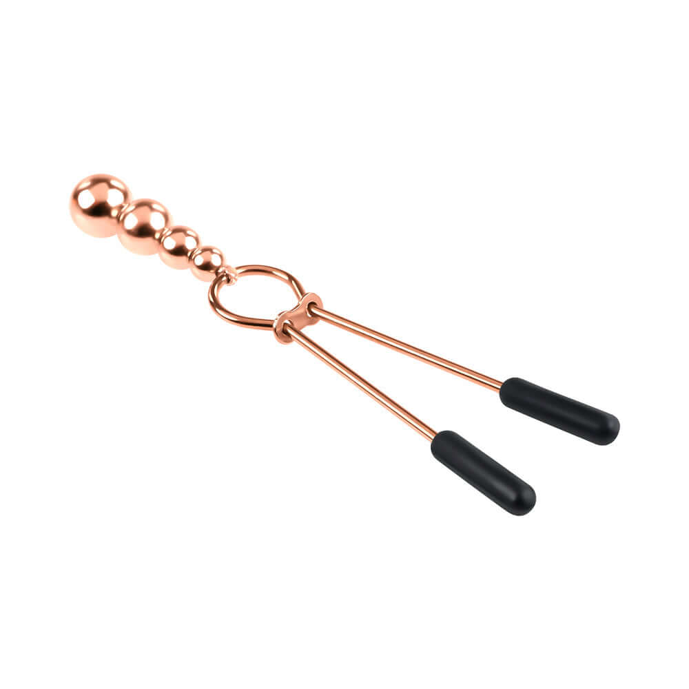 Selopa Beaded Nipple Clamps Stainless Steel Rose Gold with decorative beads and adjustable pressure for sensual stimulation.