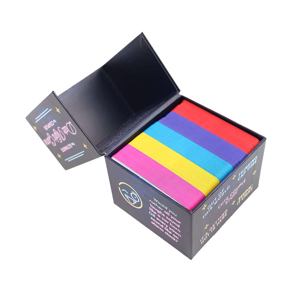 The Ultimate Date Night Game for Couples Cards in a colorful box with various card colors.