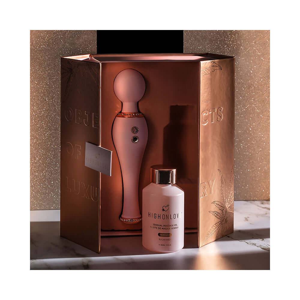 HighOnLove Objects of Luxury Gift Set featuring a body wand and sensual massage oil in a decorative box.