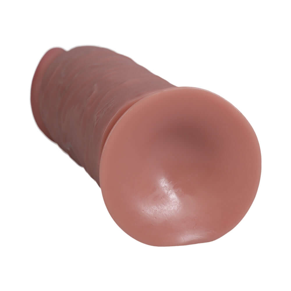 RealRock Extra Thick 9 inches Dildo Tan showcasing realistic contours and detailed veining for enhanced stimulation.