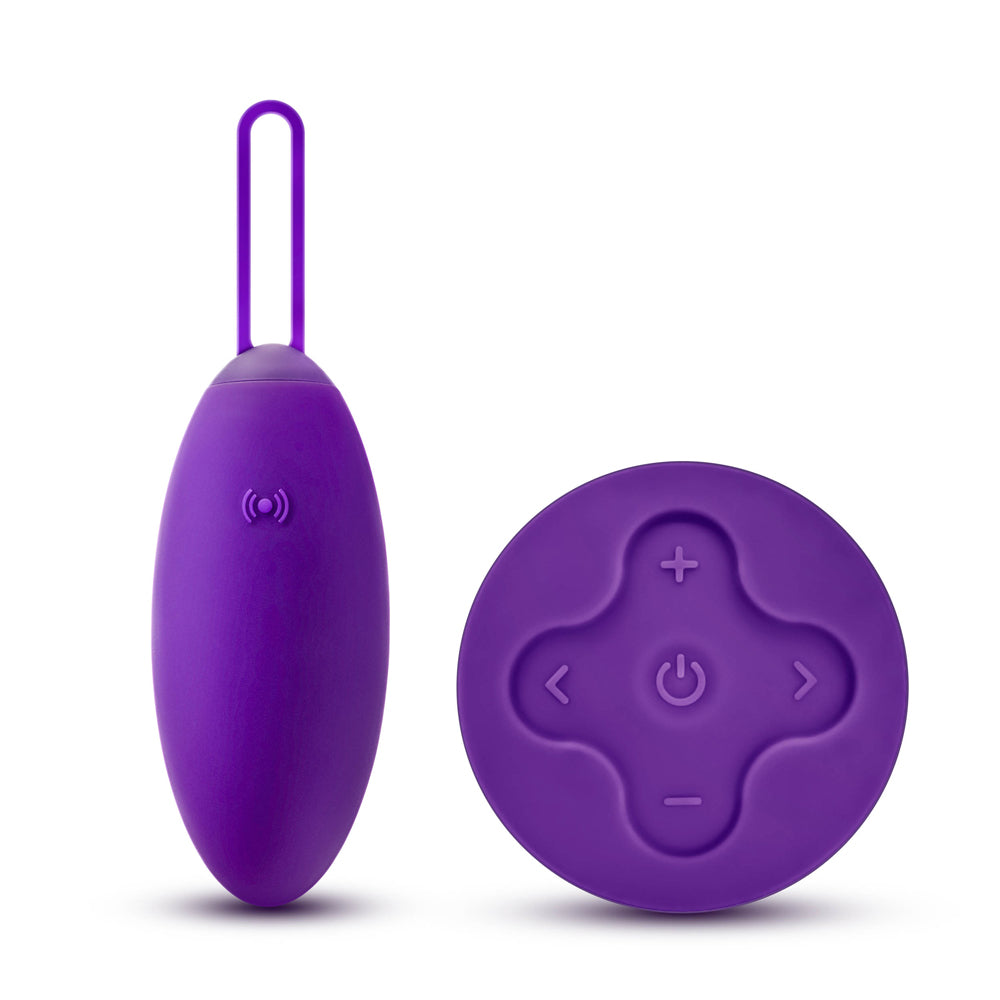 Wellness Imara Vibrating Egg with Remote Purple displayed with its remote control.
