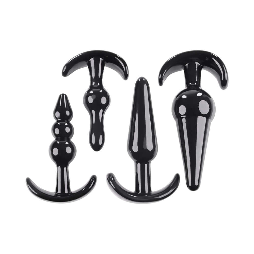 Selopa Intro To Plugs 4-Piece Anal Plug Set Black, featuring four uniquely designed black anal plugs for beginners.