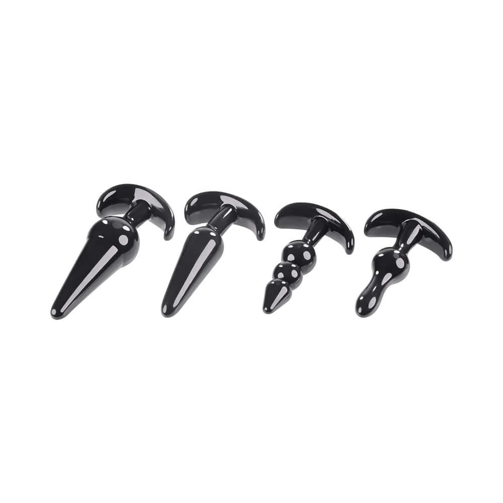 Selopa Intro To Plugs 4-Piece Anal Plug Set Black featuring four uniquely designed black anal plugs.